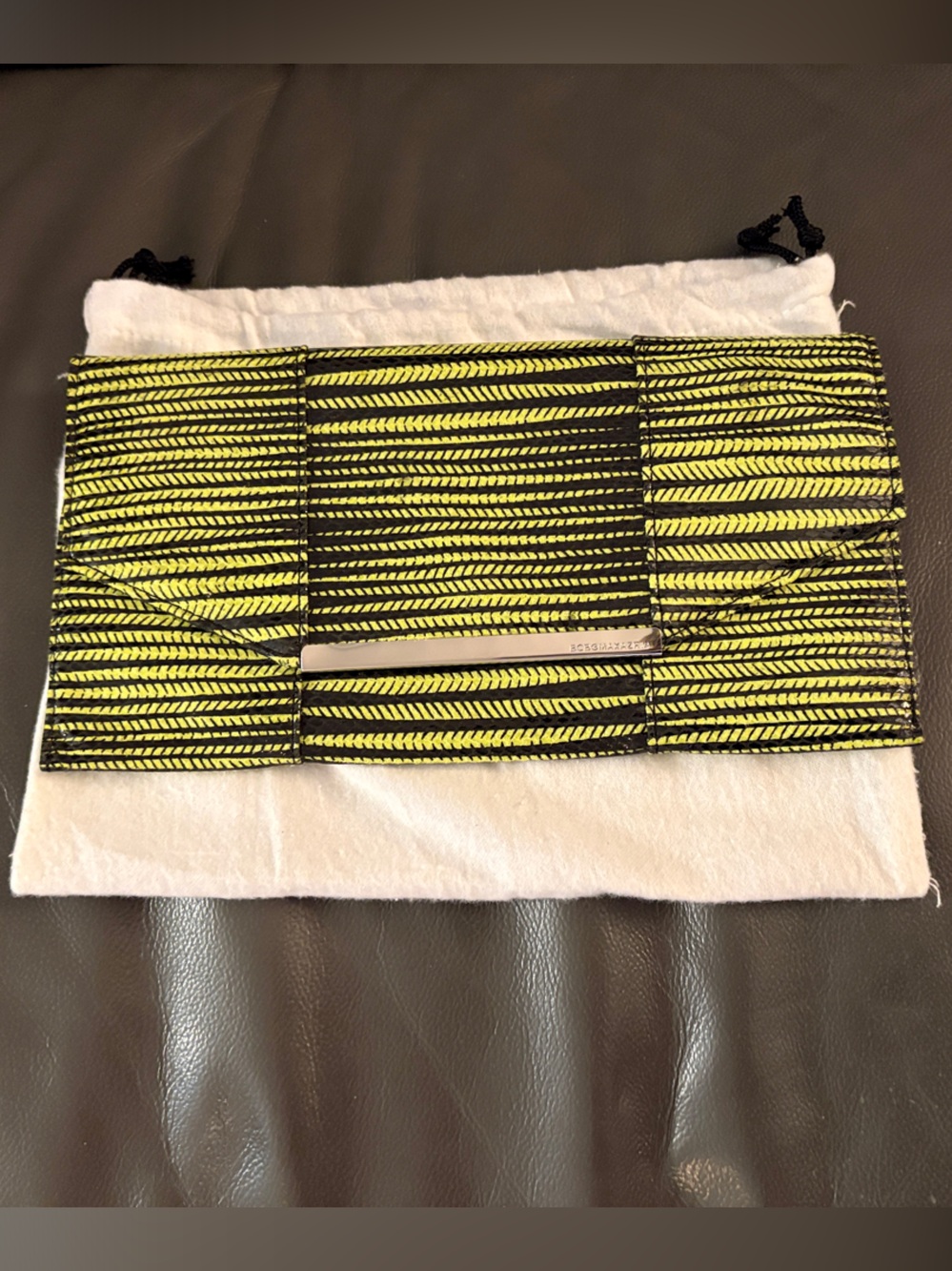 BCBGMaxAzria Yellow and Black Patterned Clutch